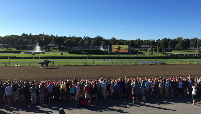 ​​​​​​​Last year I stood behind the scenes with thousands of fans to watch American Pharoah's morning gallop the day before the Travers.