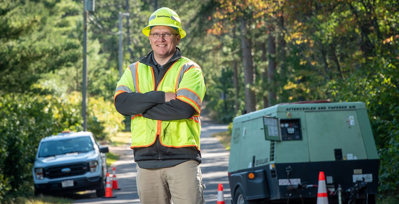 Spectrum technician working on a broadband expansion project in Northwoods section of Wisconsin